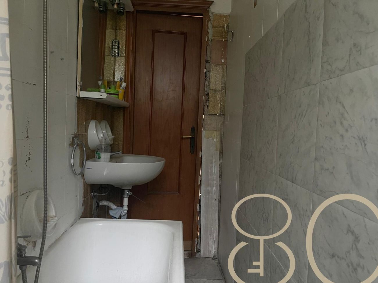 TRILOCALE CON BALCONE E AMPIA CANTINA DI PERTINENZA