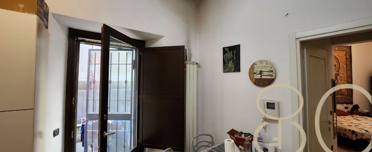 BILOCALE CON CORTILE PRIVATO E TAVERNA