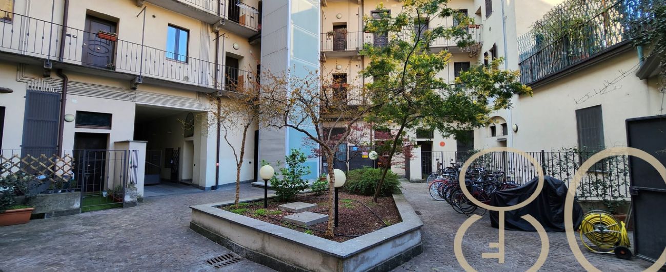 BILOCALE CON CORTILE PRIVATO E TAVERNA