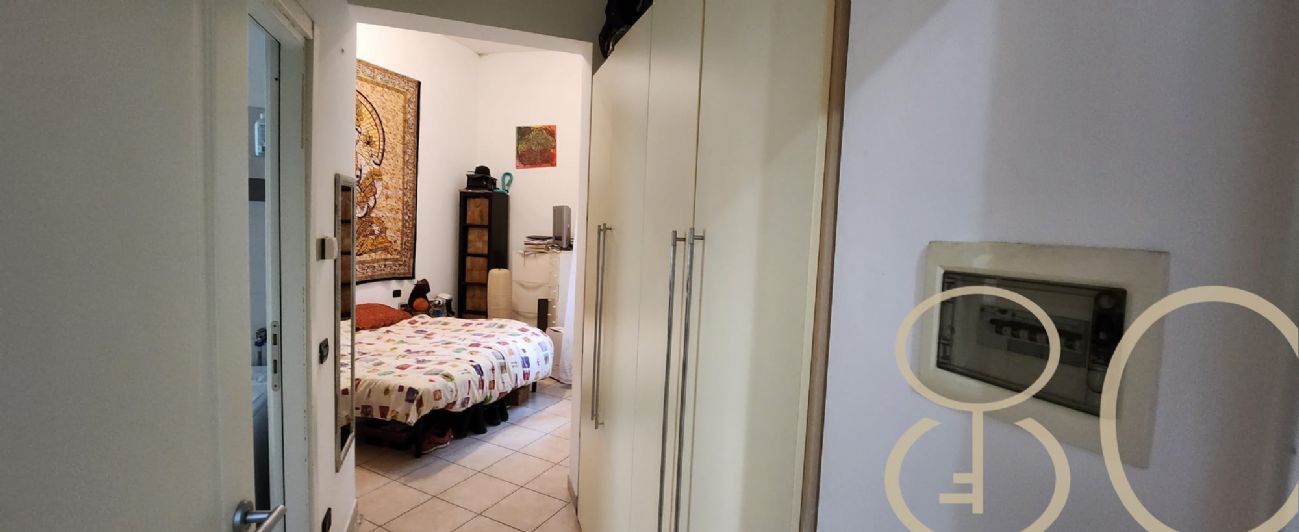BILOCALE CON CORTILE PRIVATO E TAVERNA
