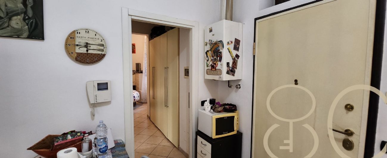 BILOCALE CON CORTILE PRIVATO E TAVERNA