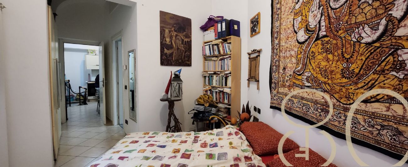 BILOCALE CON CORTILE PRIVATO E TAVERNA