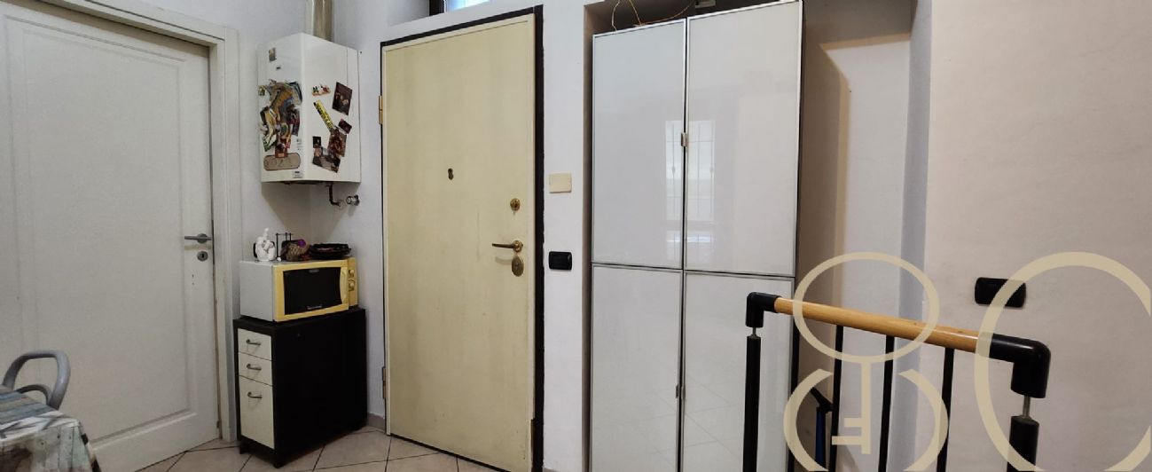 BILOCALE CON CORTILE PRIVATO E TAVERNA