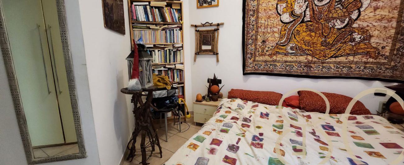BILOCALE CON CORTILE PRIVATO E TAVERNA