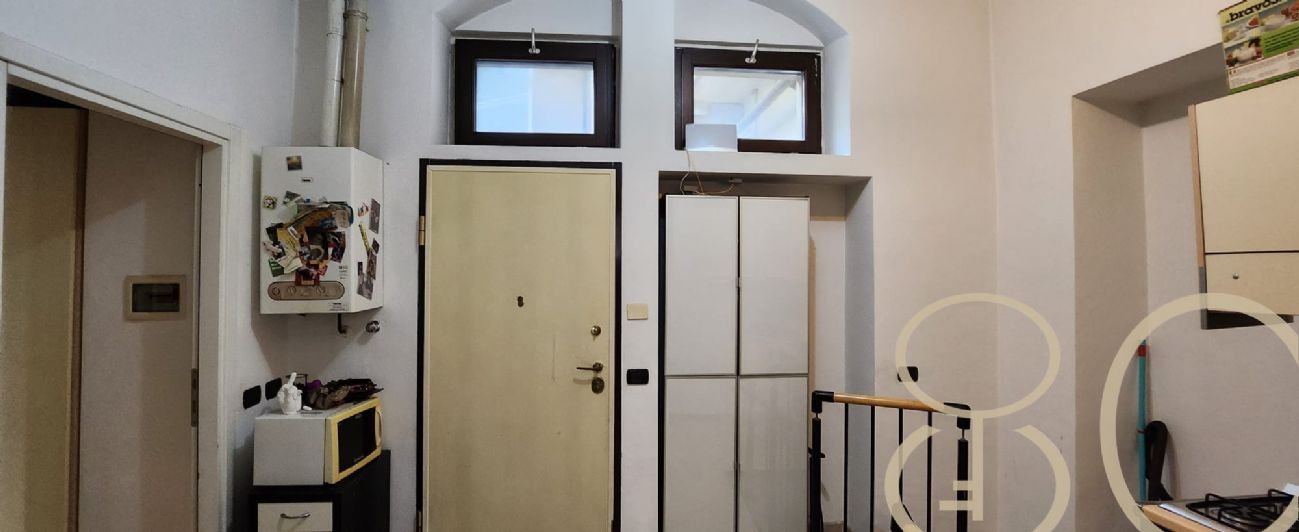 BILOCALE CON CORTILE PRIVATO E TAVERNA