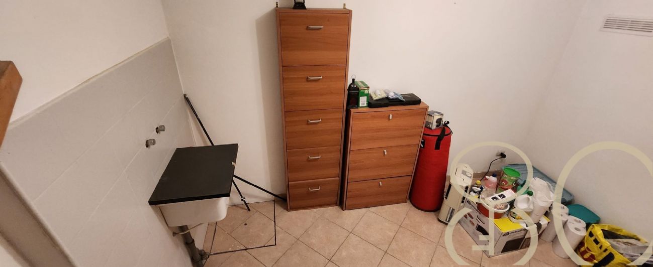BILOCALE CON CORTILE PRIVATO E TAVERNA