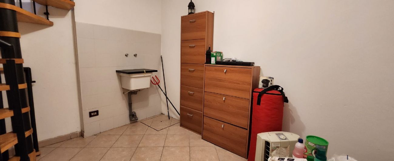 BILOCALE CON CORTILE PRIVATO E TAVERNA