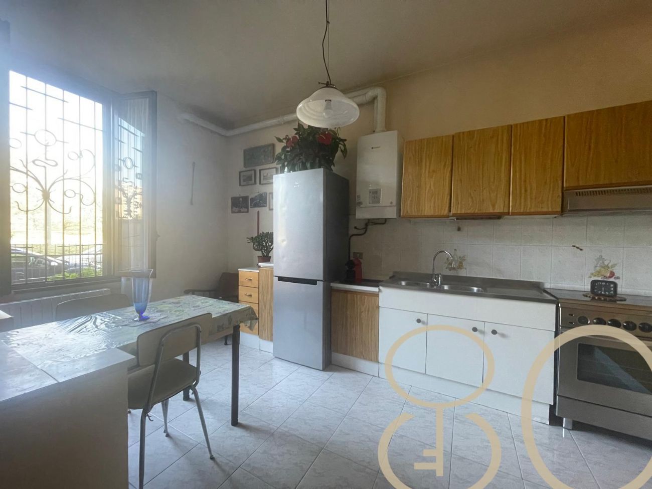 AMPIO TRILOCALE CON GIARDINO PRIVATO