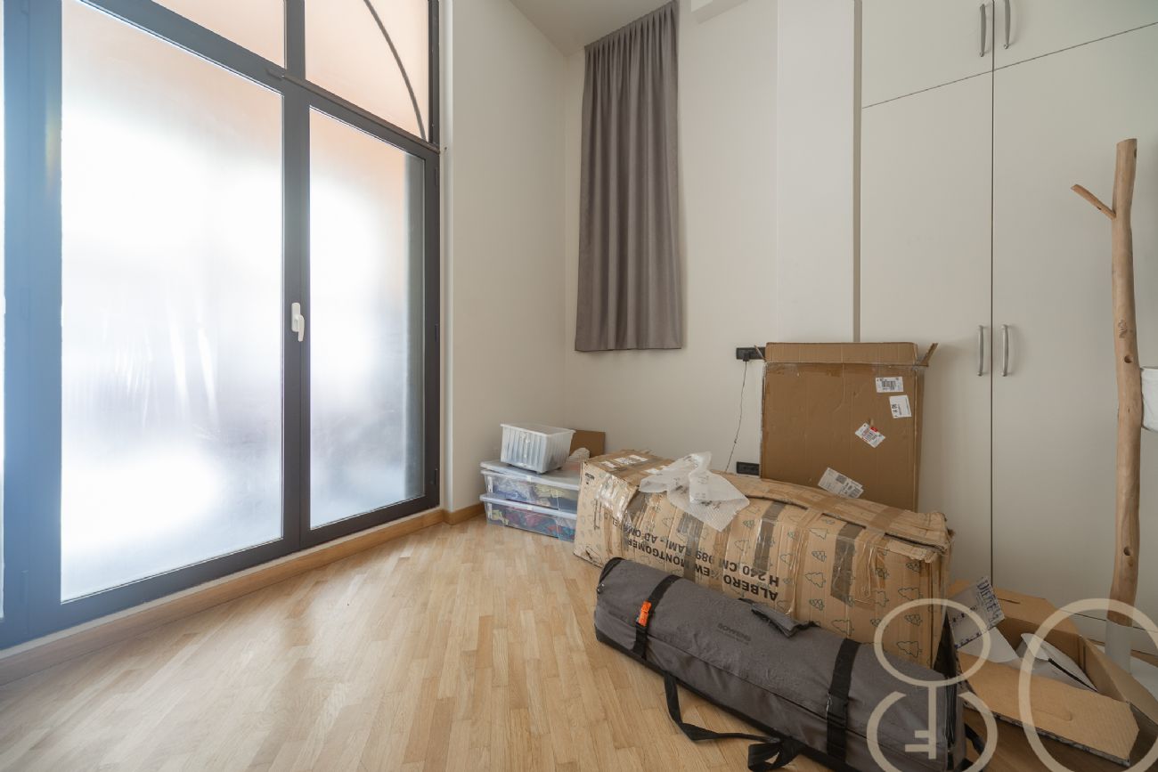 LOFT CON TRE CAMERE PATIO PRIVATO E BOX