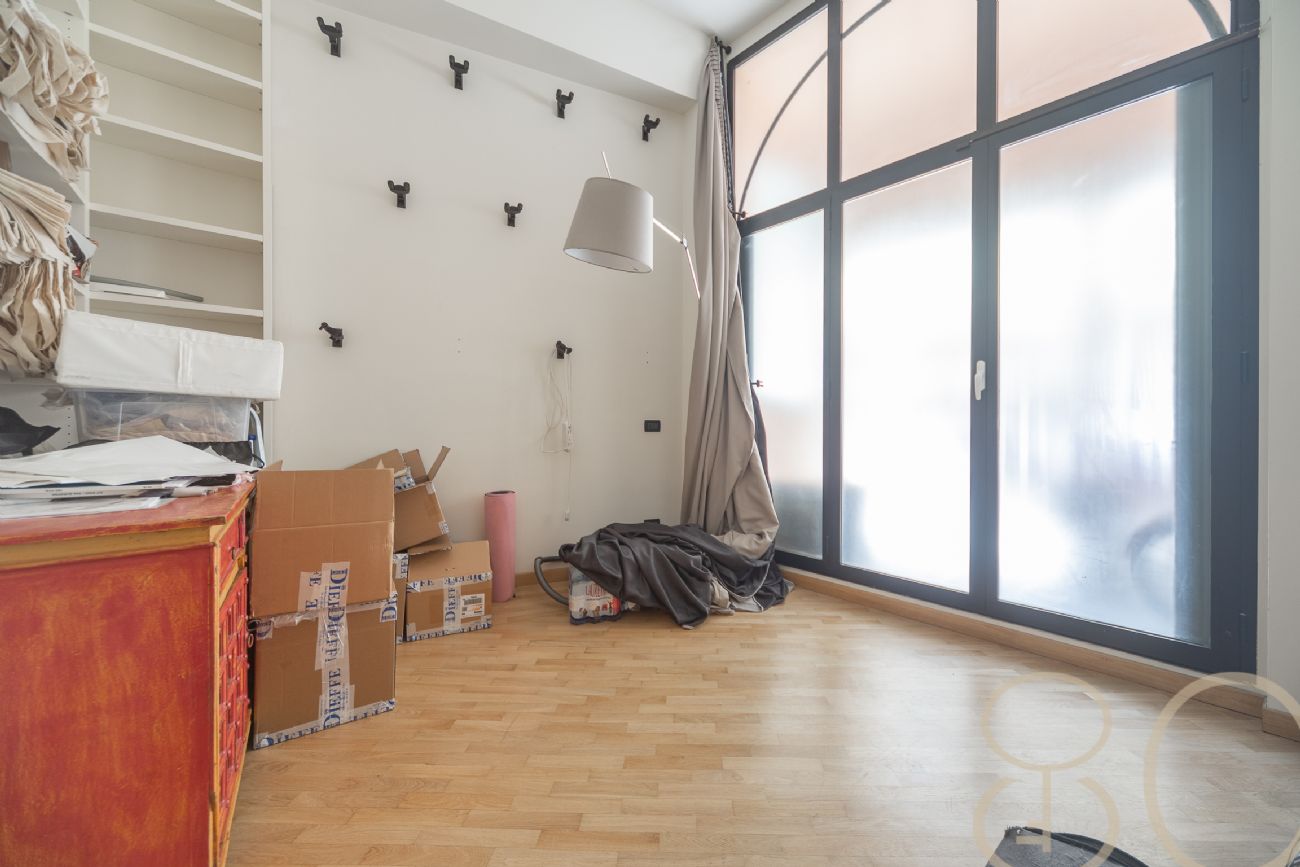 LOFT CON TRE CAMERE PATIO PRIVATO E BOX