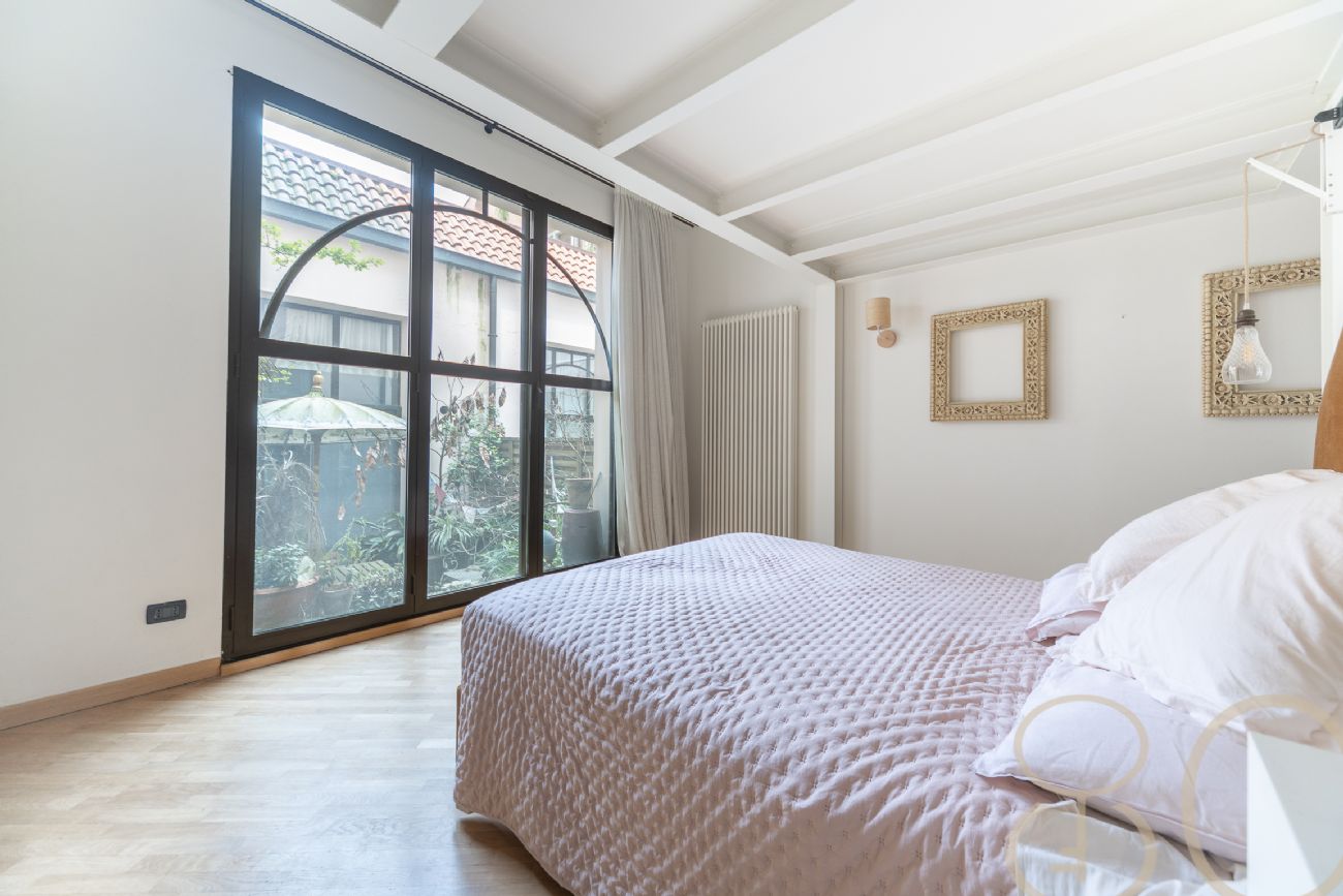 LOFT CON TRE CAMERE PATIO PRIVATO E BOX